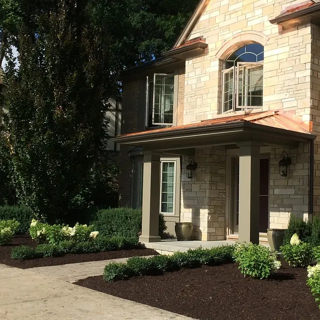 House with a freshly landscaped front yard